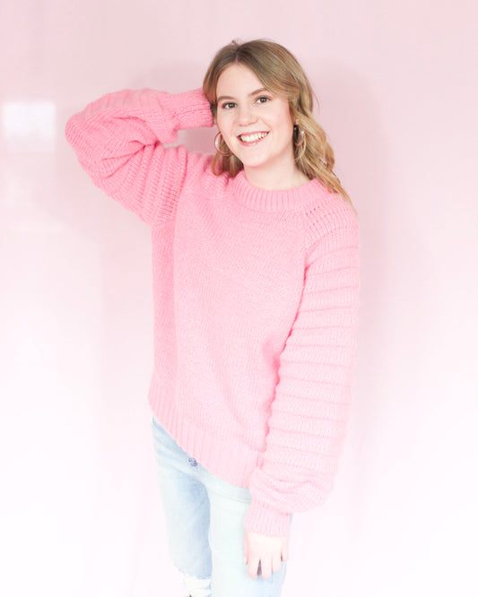 Bright pink thick sweater with ribbed hem round neck and raglan balloon sleeves 