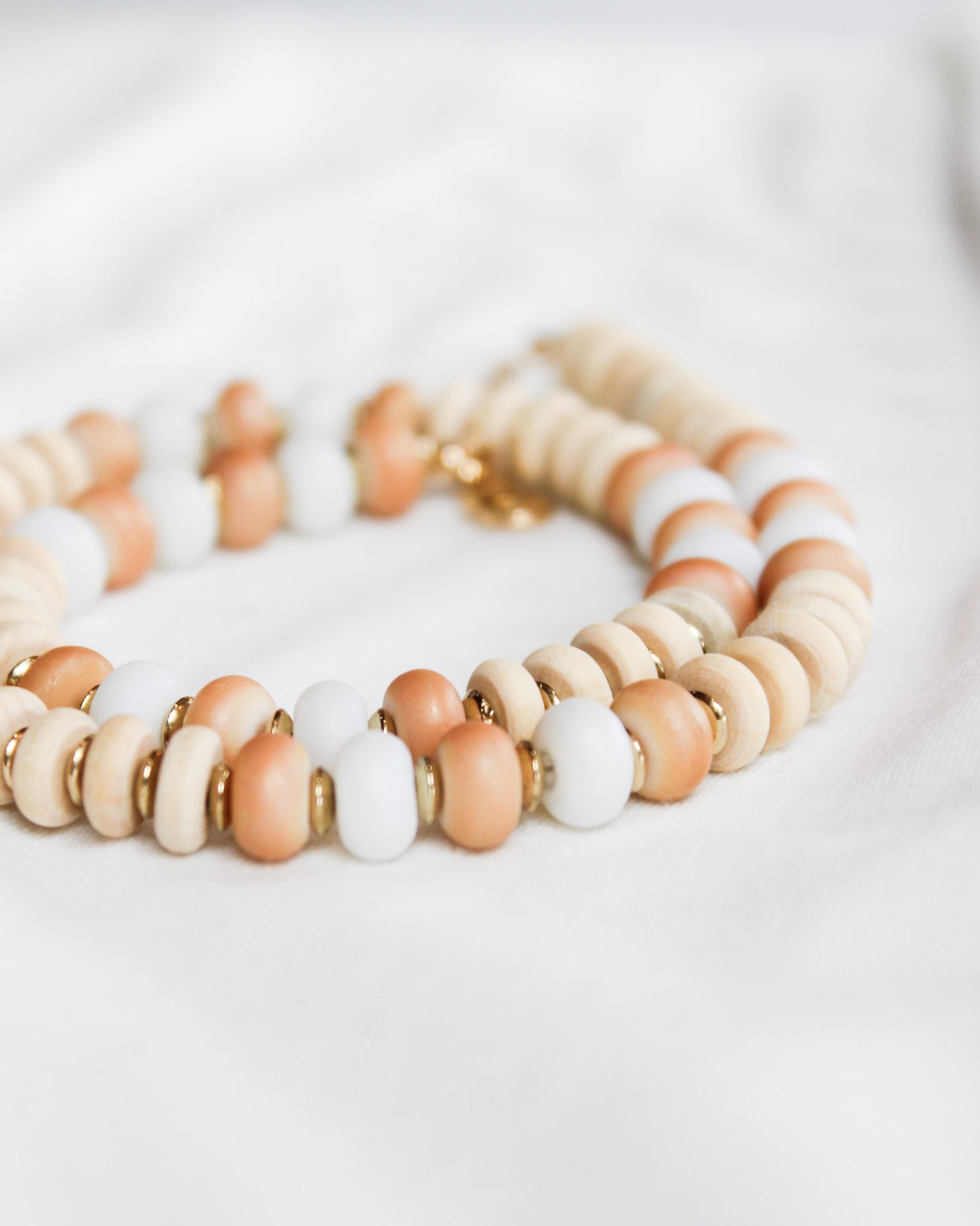Mixed peach color beaded short necklace on gold chain