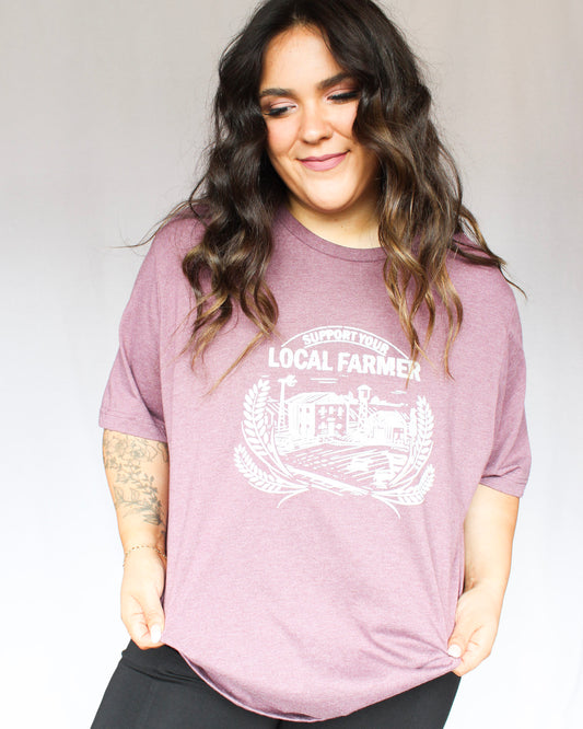 Purple Support Your Local Farmer graphic tshirt with farm photo all in a light grey 