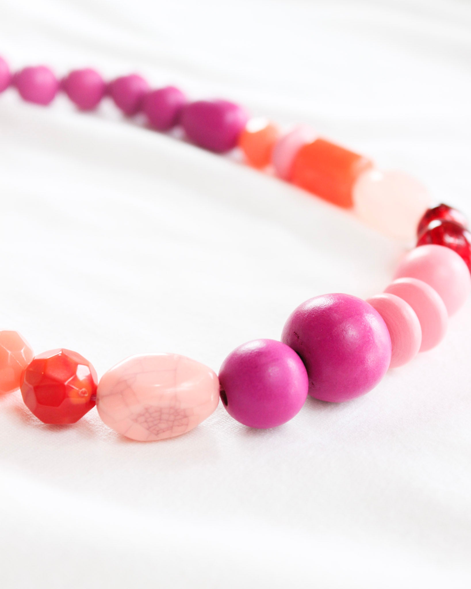Bright pink and red mix beaded necklace with easy closure