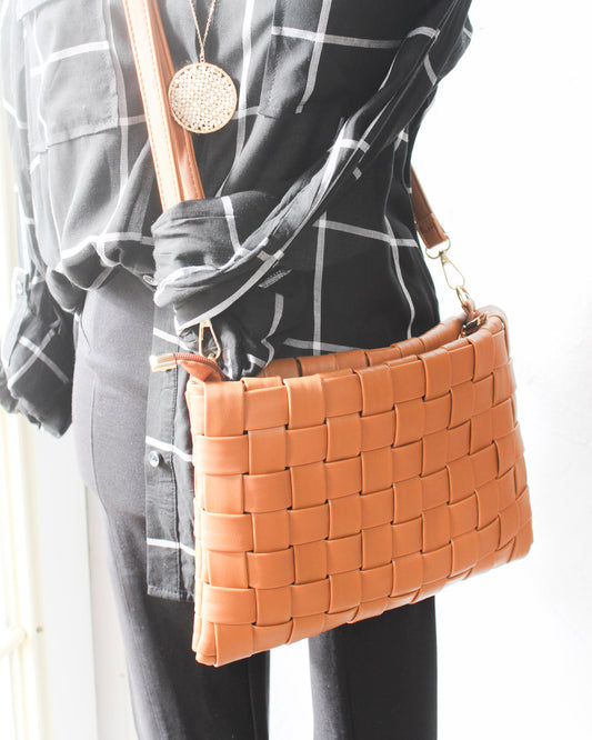 Rich tan color weaved rectangle clutch or crossbody purse with gold zipper and adjustable strap 