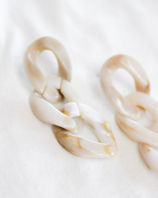 Marble effect cream and tan mix statement three chain earrings