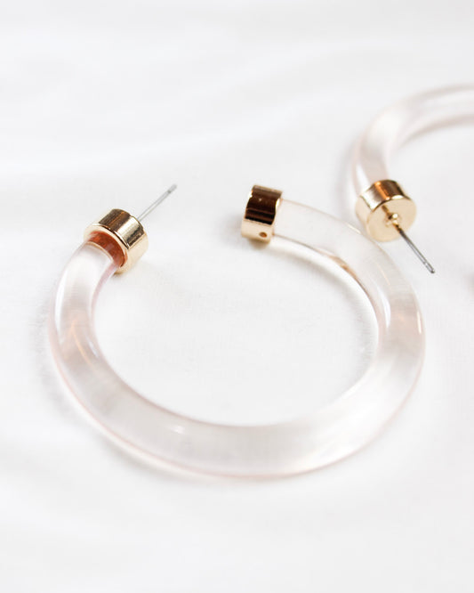 Translucent pink hoops with gold accents 