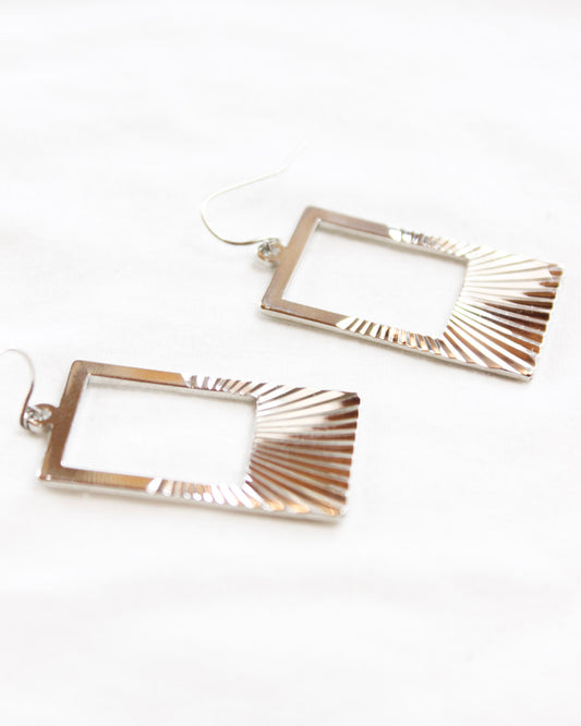 Silver earrings hollow rectangle with upside down sunrise on the bottom 