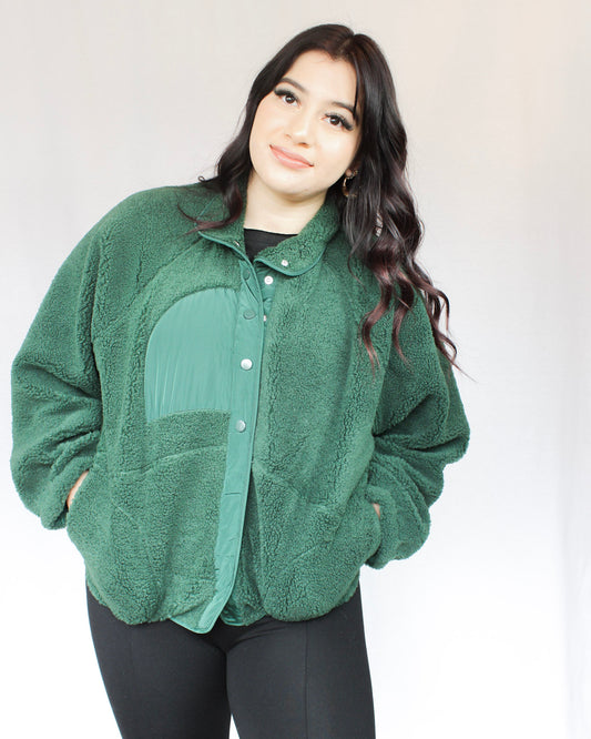 Fuzzy soft forest green button up jacket with two pockets and roll down collar