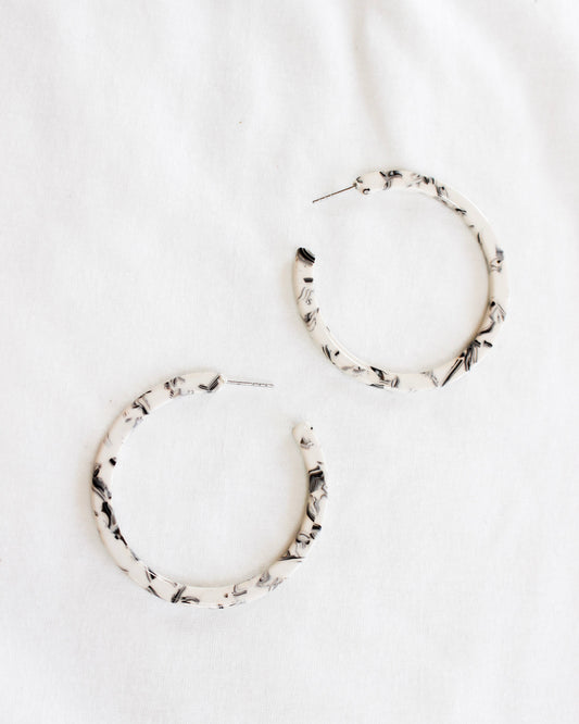 Black and white marble thin statement hoops 