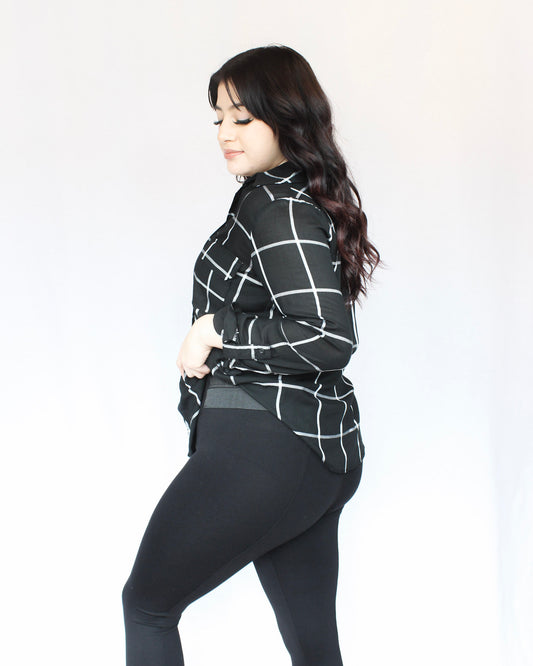 Elastic waistband black legging pants with seam line down the front of each leg