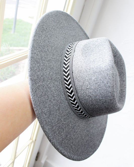 Heather grey boho fedora wide brim hat with black and white angled design strip wrapped around brim