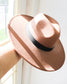 Tan Wide brim fedora hat with black ribbon around the base 