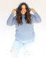 Blue fuzzy popcorn sweater with hood and long sleeves